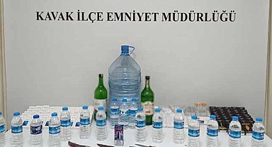 Samsun Kavak'ta tütüncüde  sahte alkol ve makaron ele geçirildi